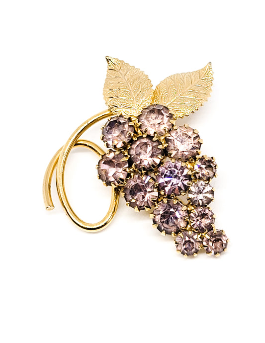 Purple rhinestone gold toned vintage grape cluster brooch