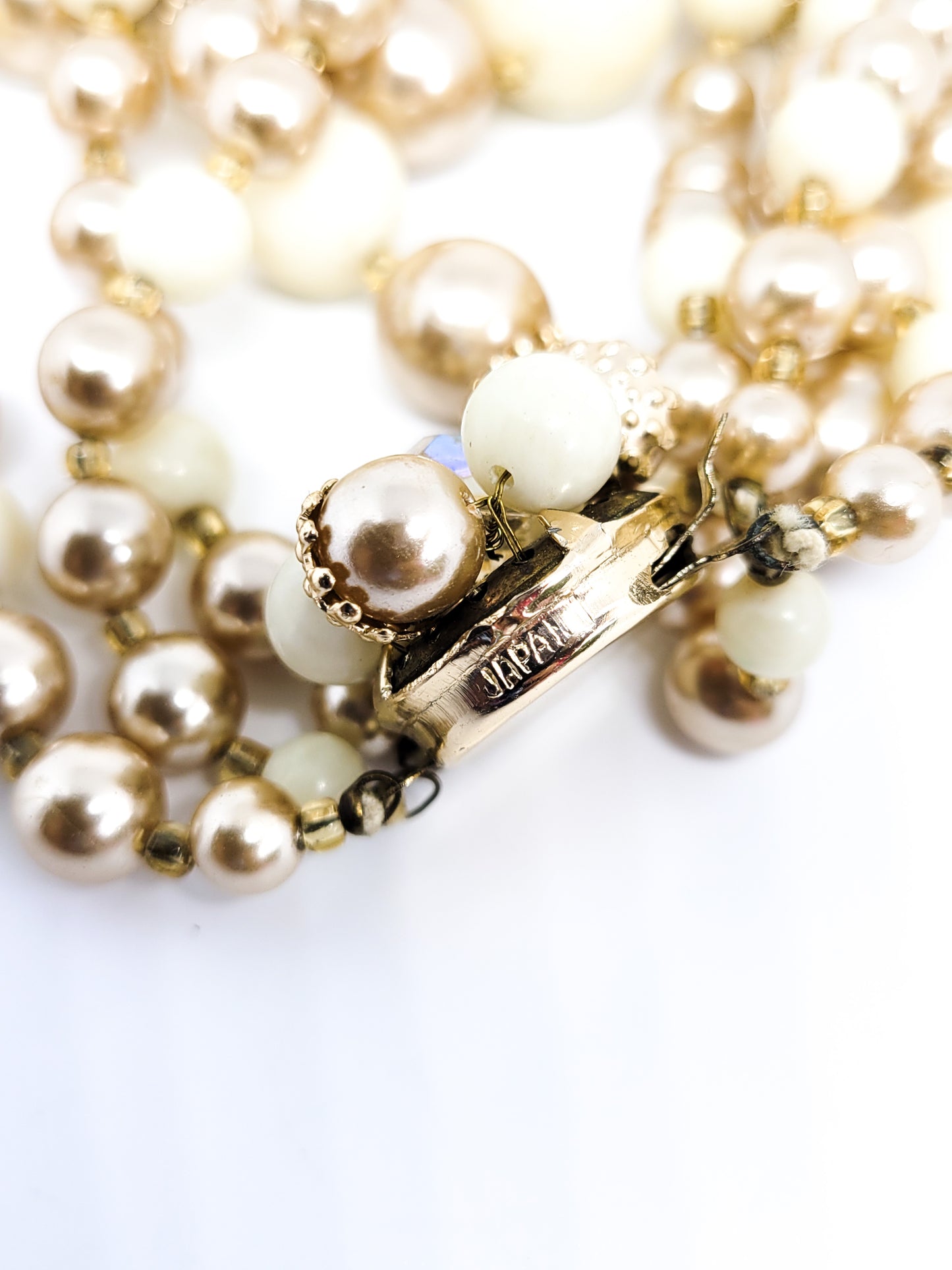 Shades of cream pearl Lucite Austrian crystal triple strand vintage necklace