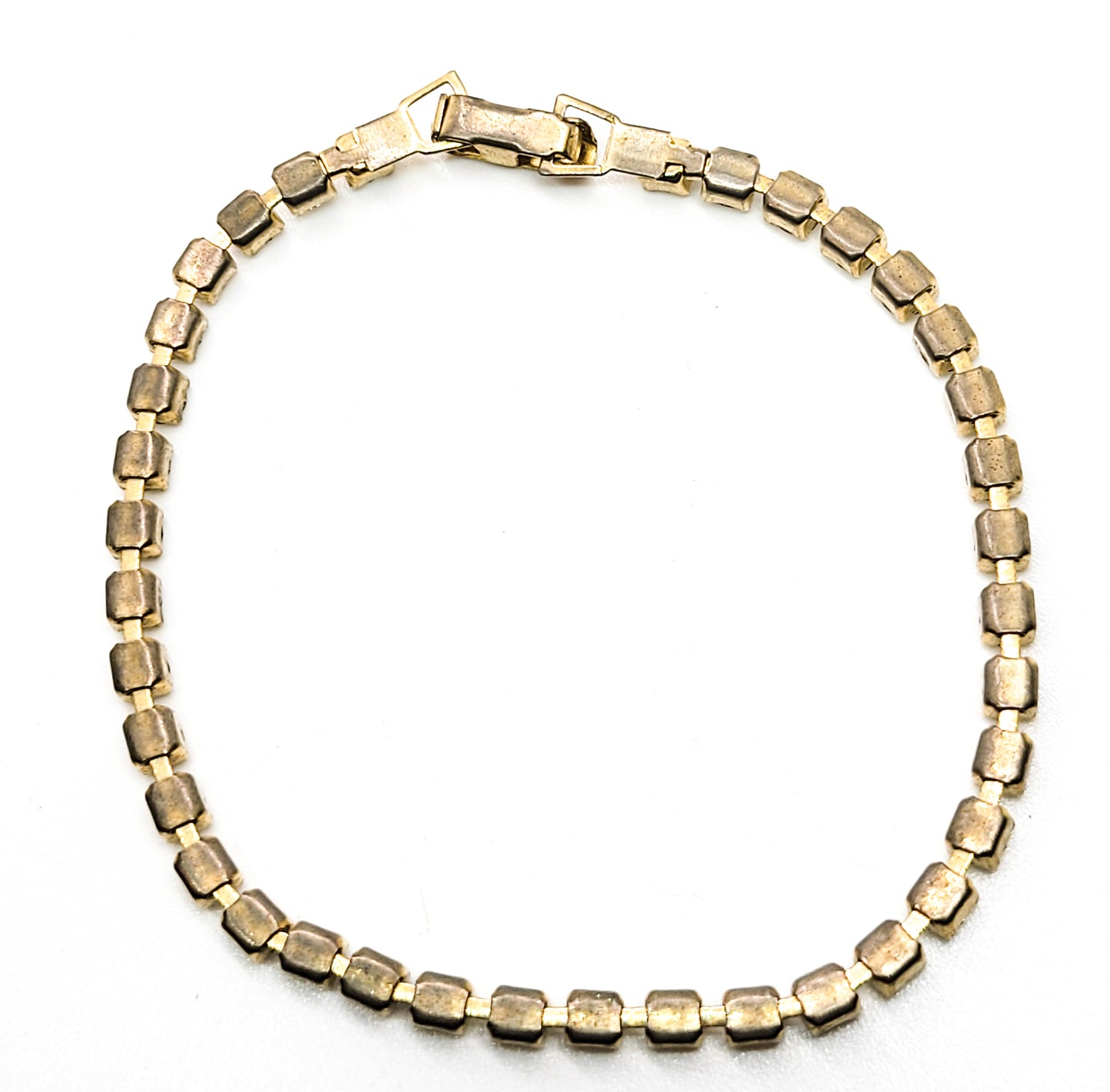 Single row simple clear gold toned vintage rhinestone tennis bracelet