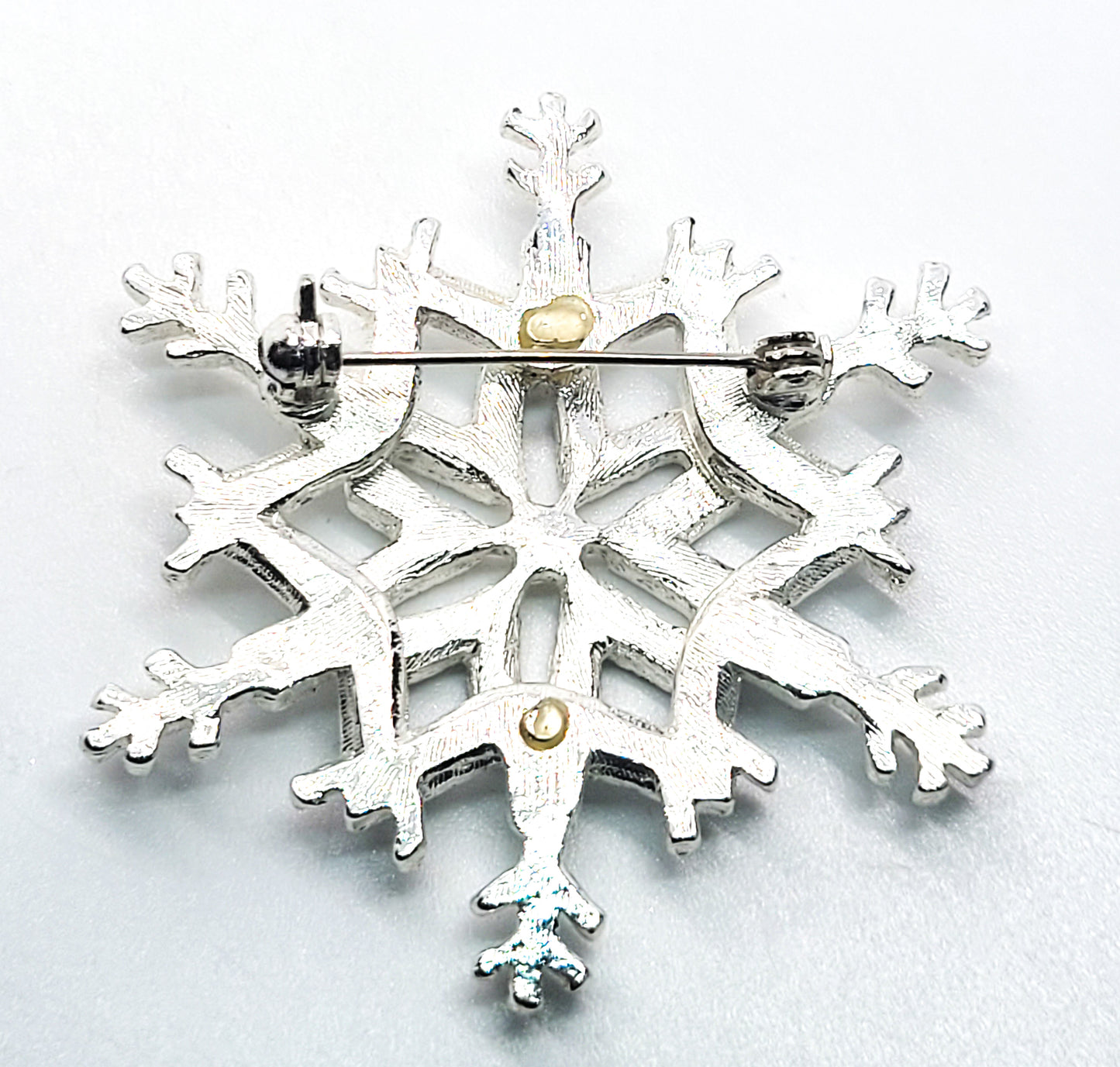 Silver snowflake winter clear rhinestone brooch