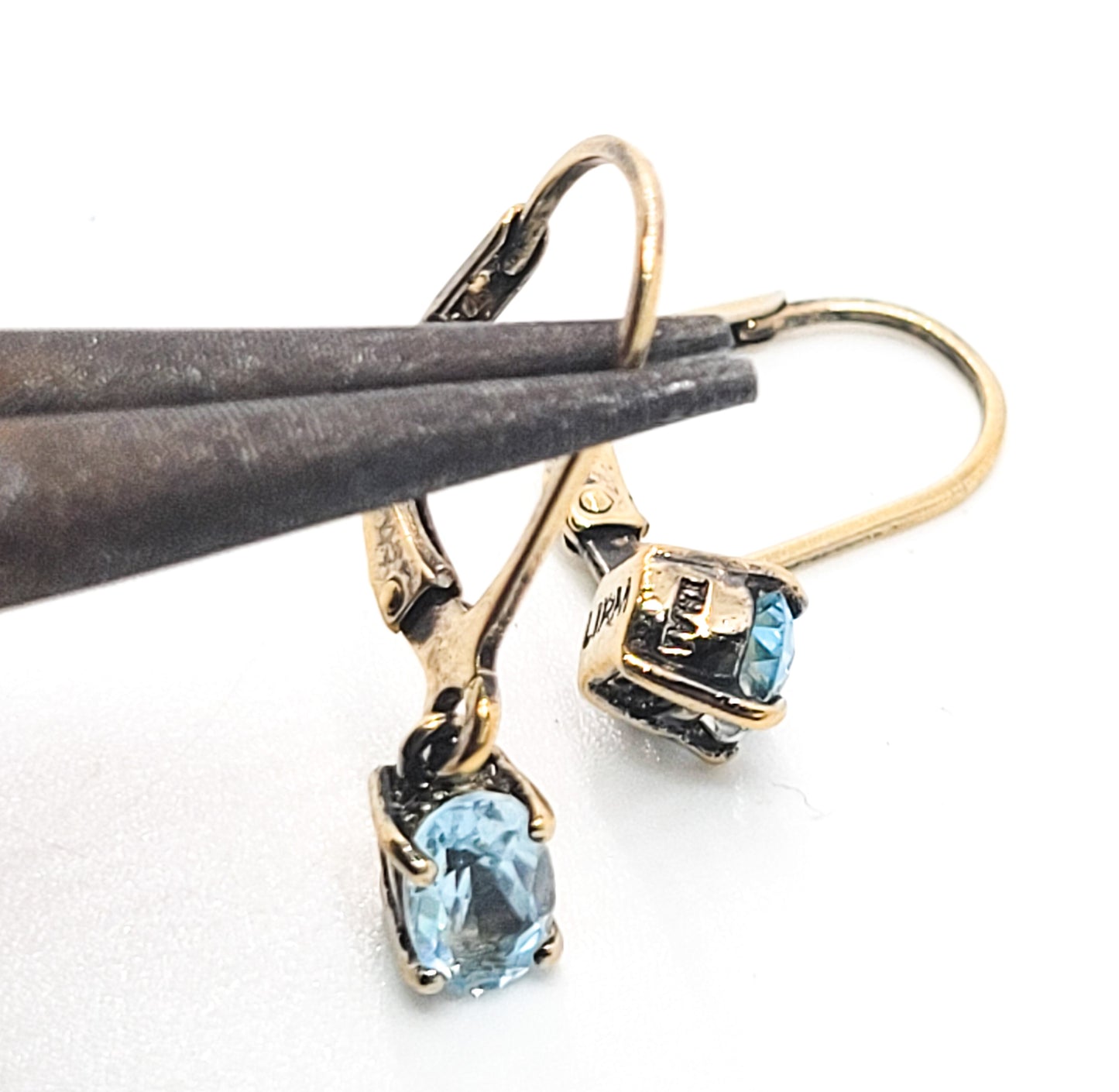 Lirm Blue topaz oval cut gold over sterling silver lever back earrings