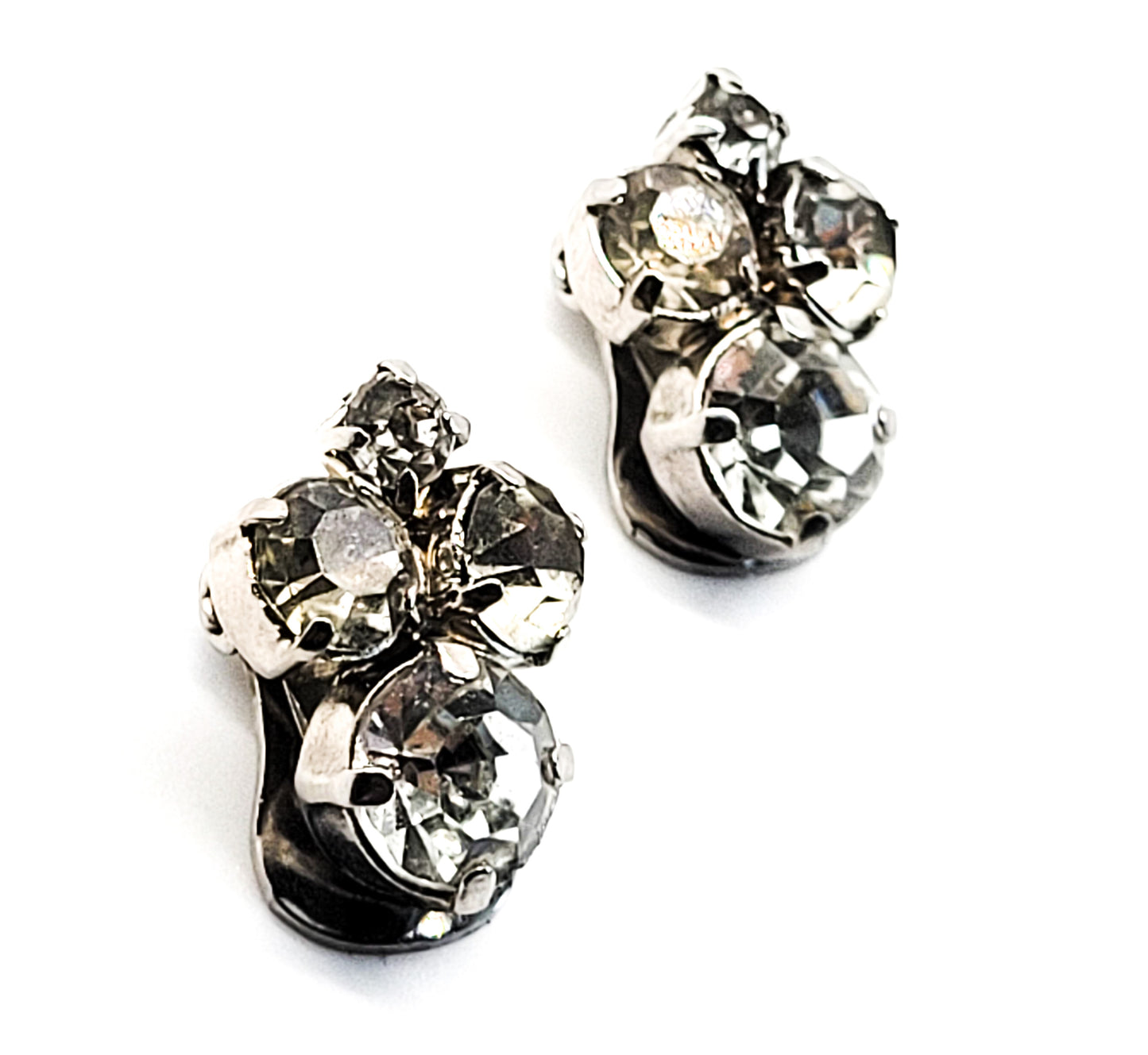 Bright vintage clear rhinestone silver toned button clip on earrings mid century