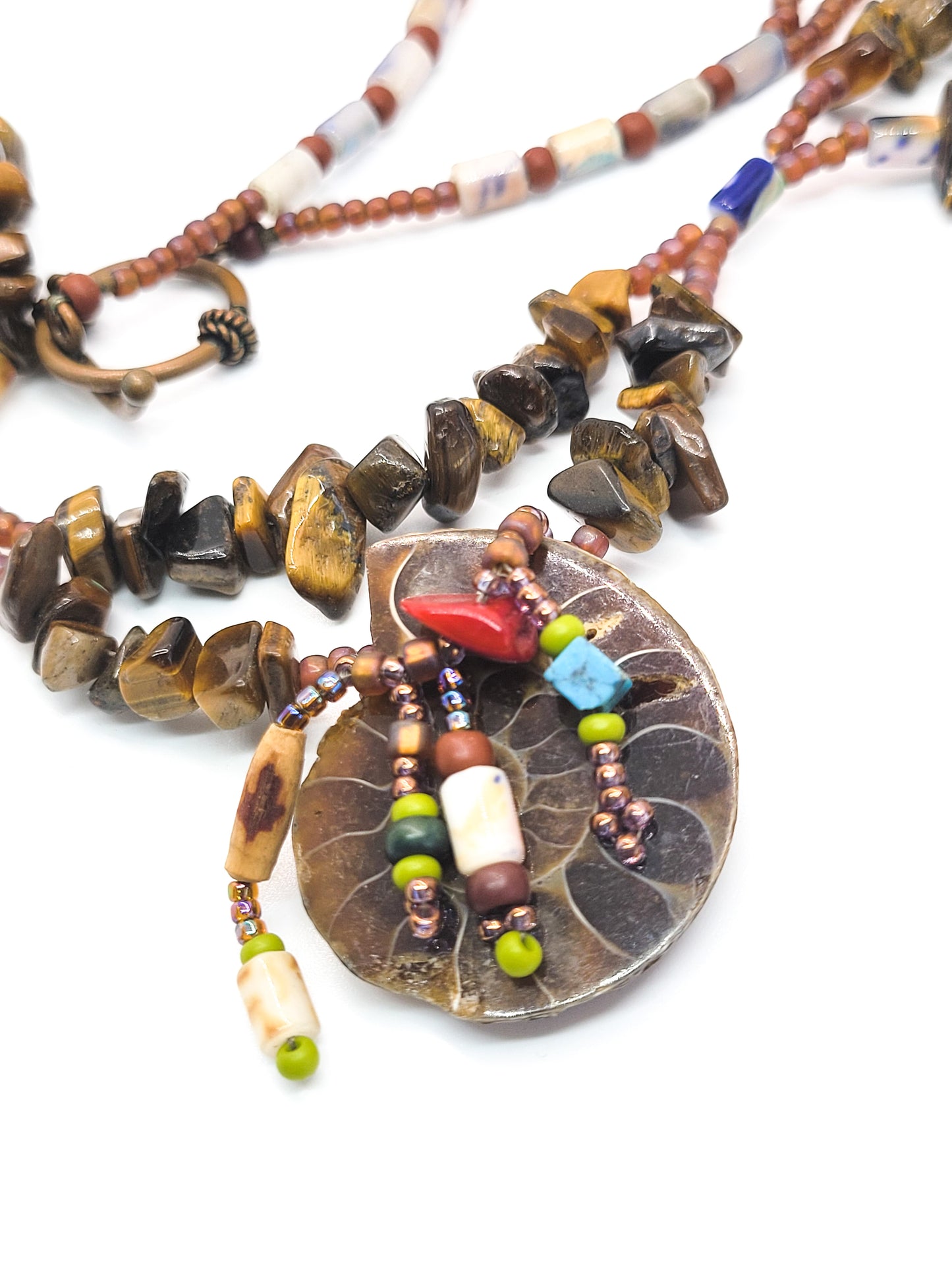 Artisan Tiger's eye scalloped heishe beaded Ammonite shell fetish style necklace