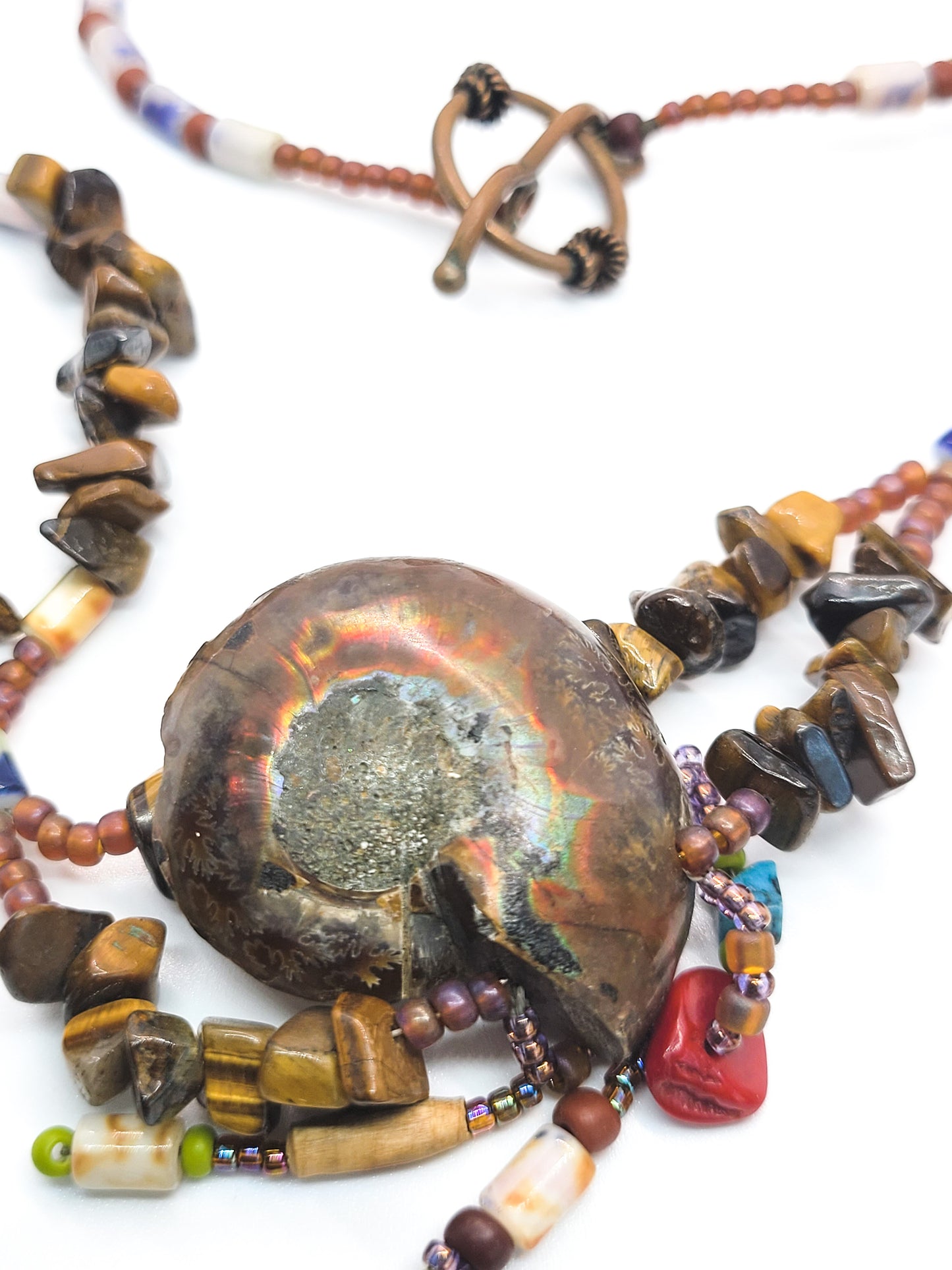 Artisan Tiger's eye scalloped heishe beaded Ammonite shell fetish style necklace