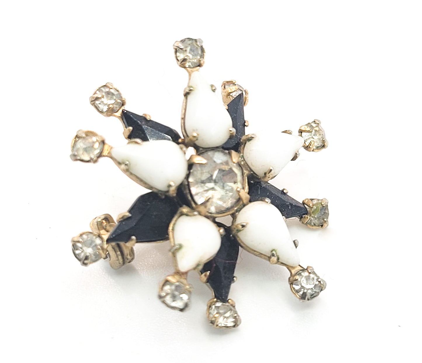 Black and white harlequin star vintage gold toned rhinestone brooch