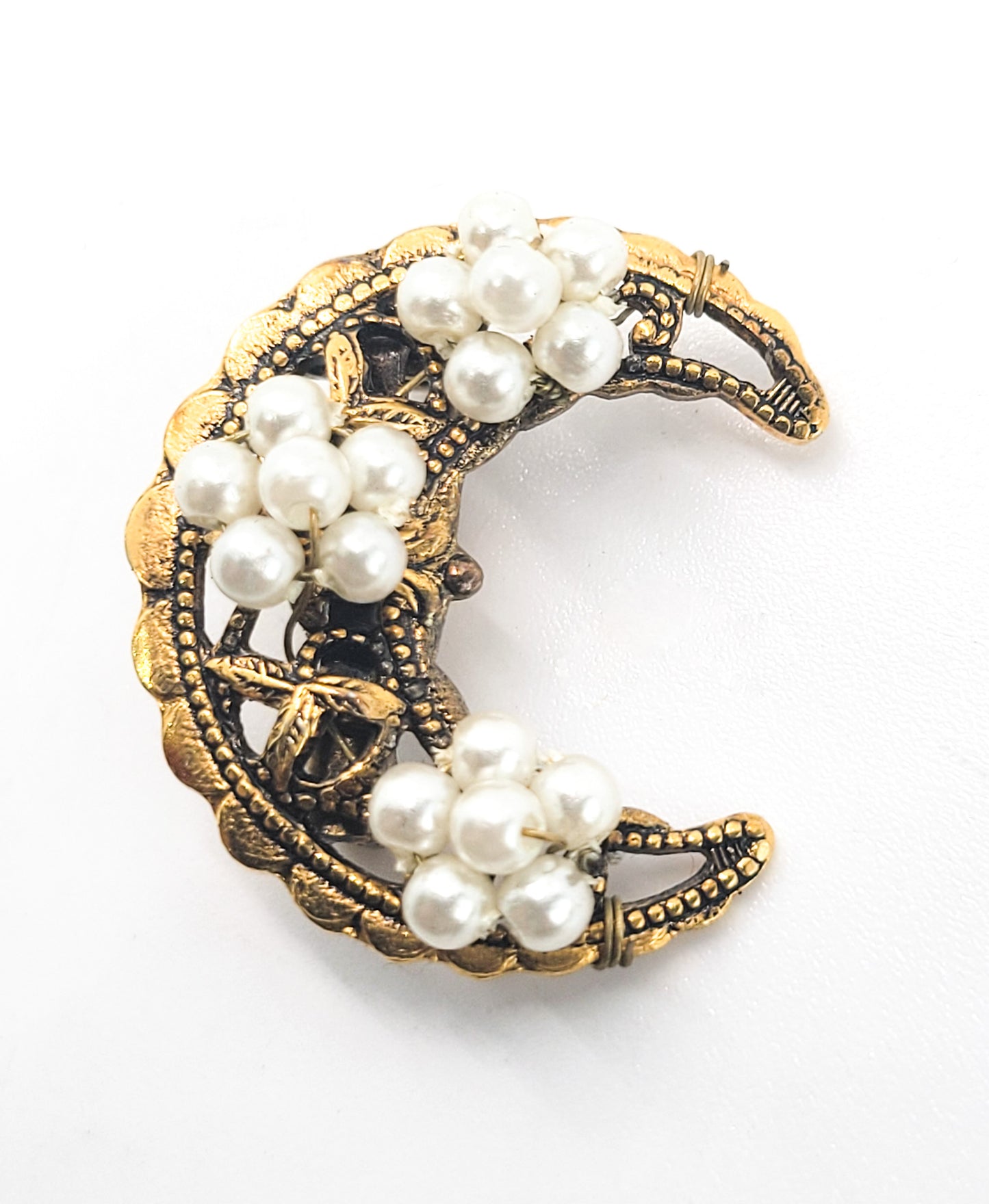 Crescent moon gold toned vintage brooch with beaded white flower accents