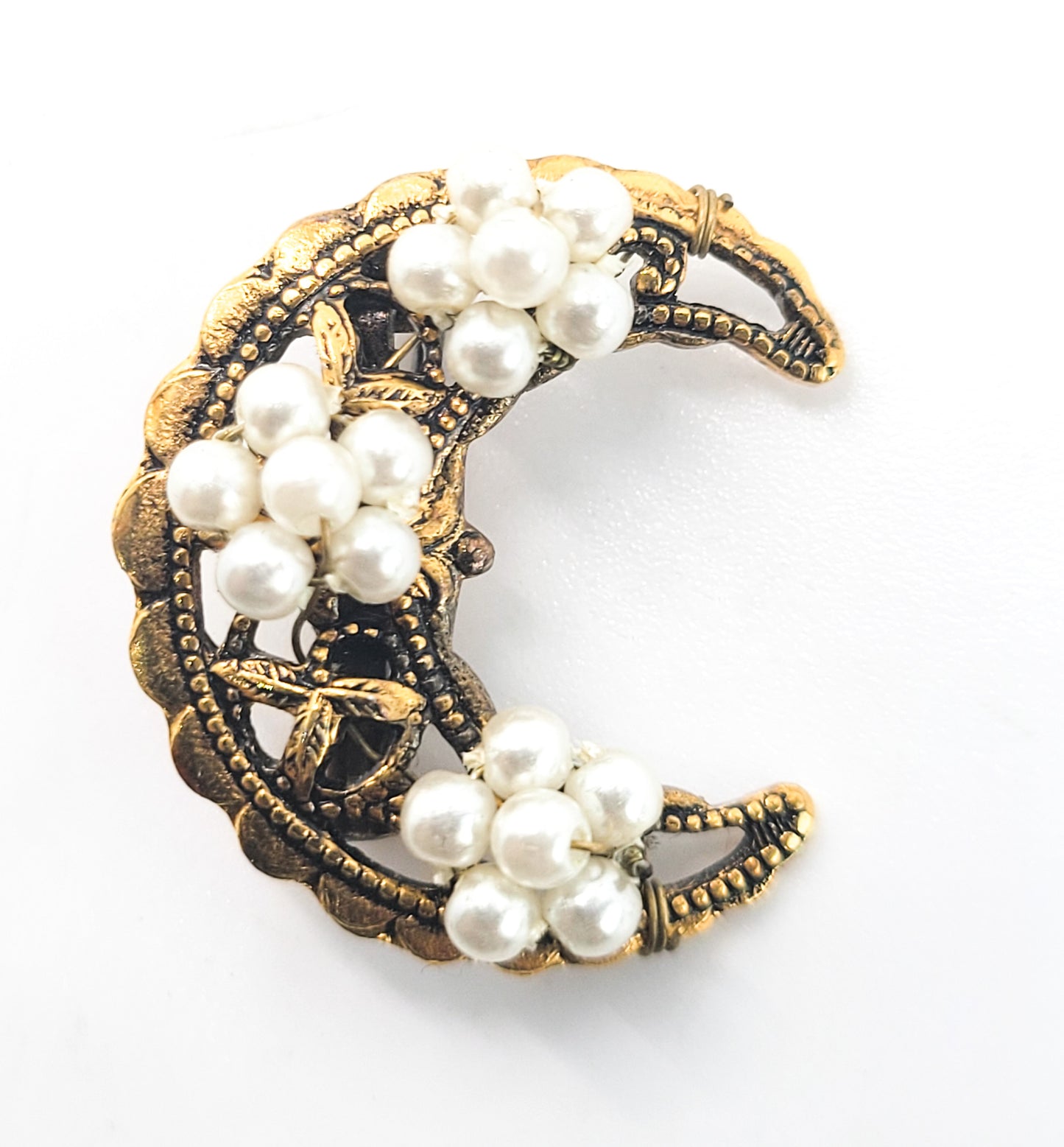 Crescent moon gold toned vintage brooch with beaded white flower accents