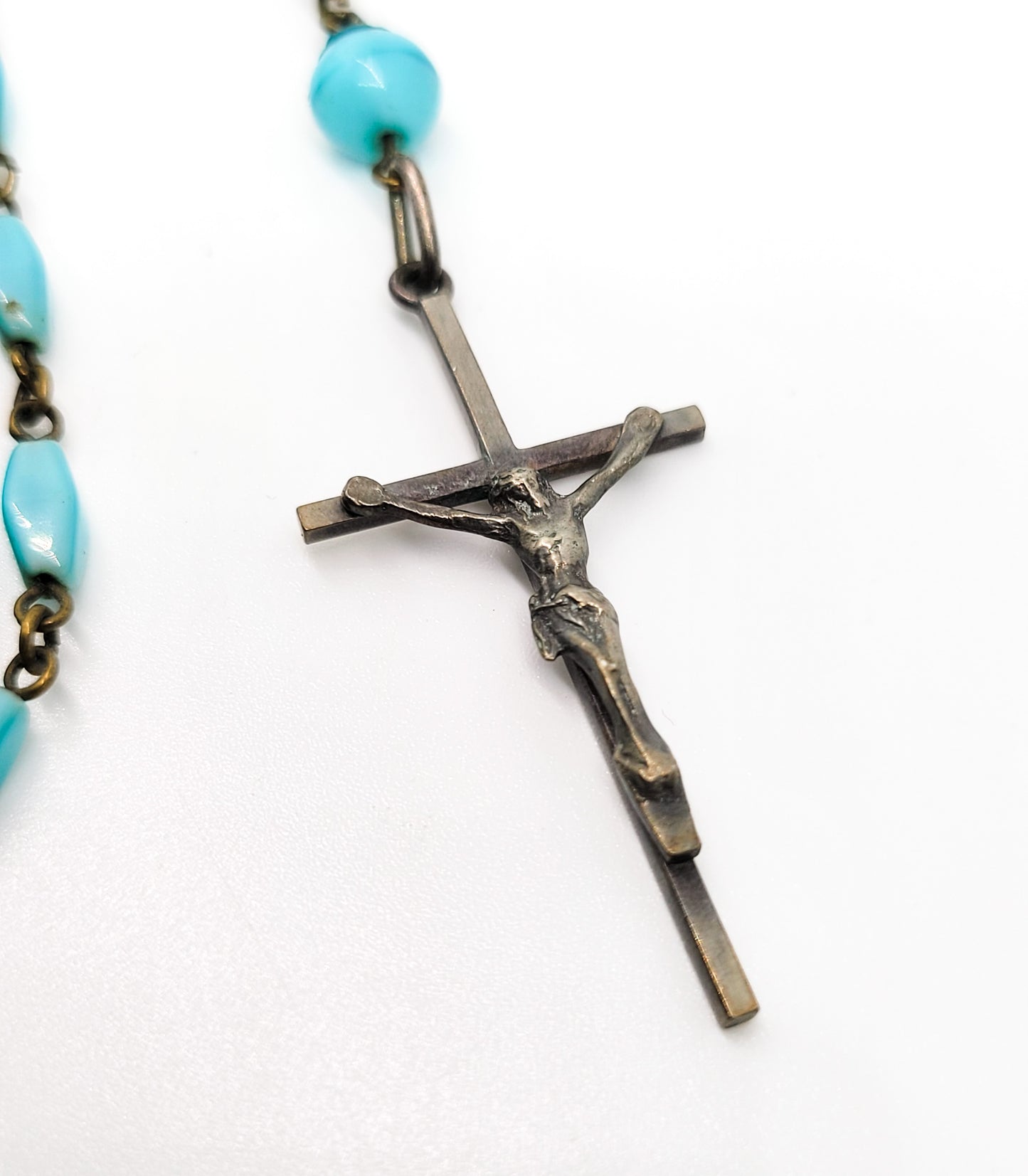 Blue satin glass vintage silver toned crucifix with clover accents