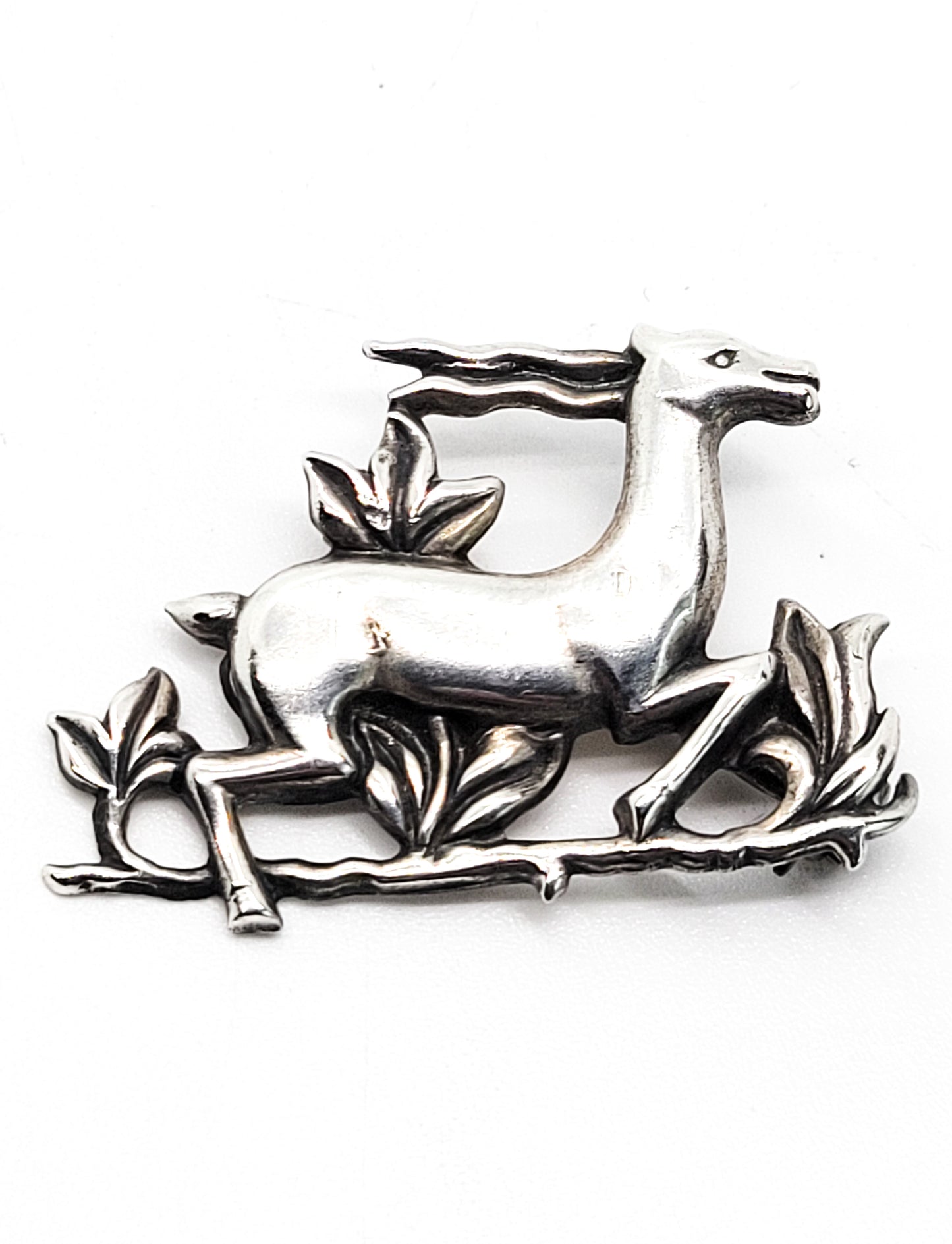 Gazelle repousse sterling silver unsigned Coro vintage brooch pin