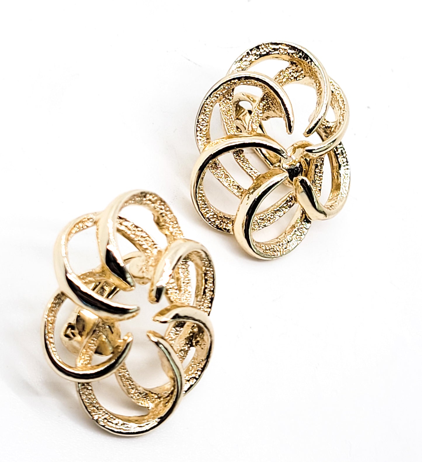 Sarah Coventry atomic spiral gold flower vintage clip on earrings