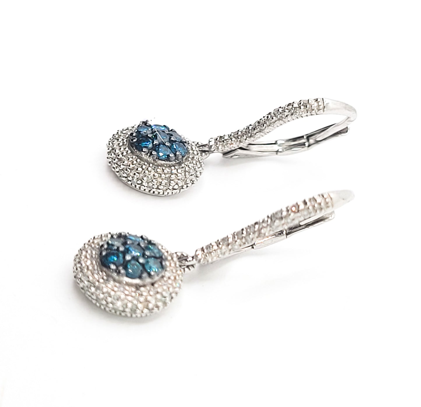 Blue and white diamond Rhodium over sterling silver decorated lever back earrings