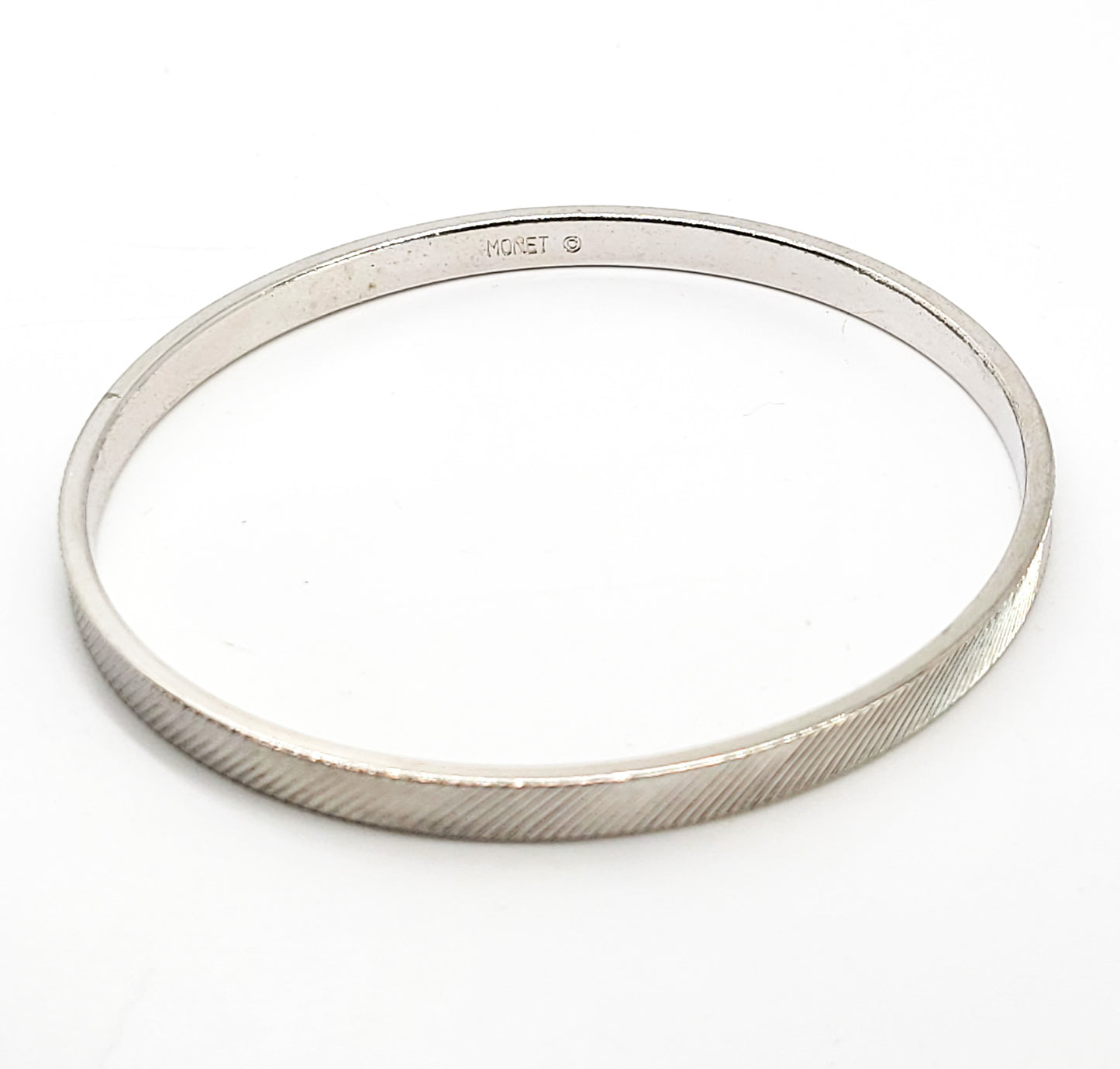 Monet silver toned etched line thin textured vintage bangle bracelet
