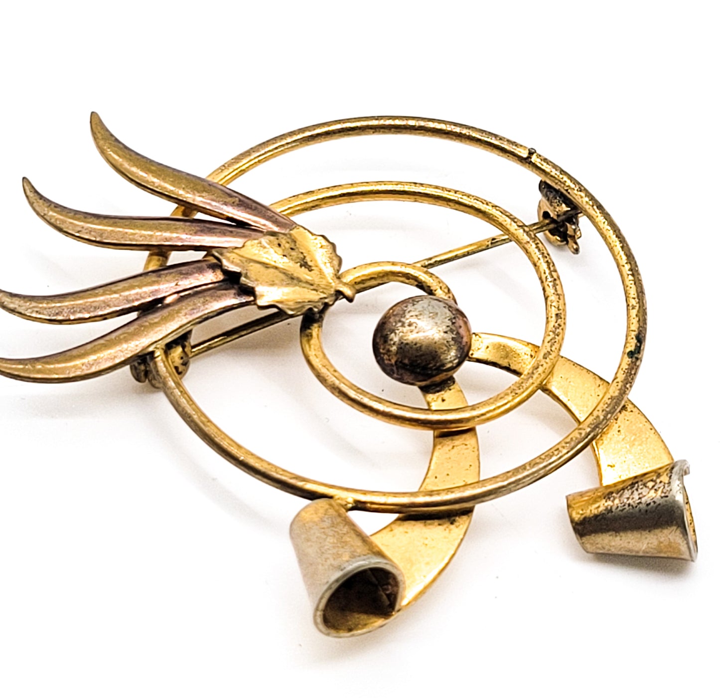 Modernist gold toned atomic spiral 2 tone vintage brooch