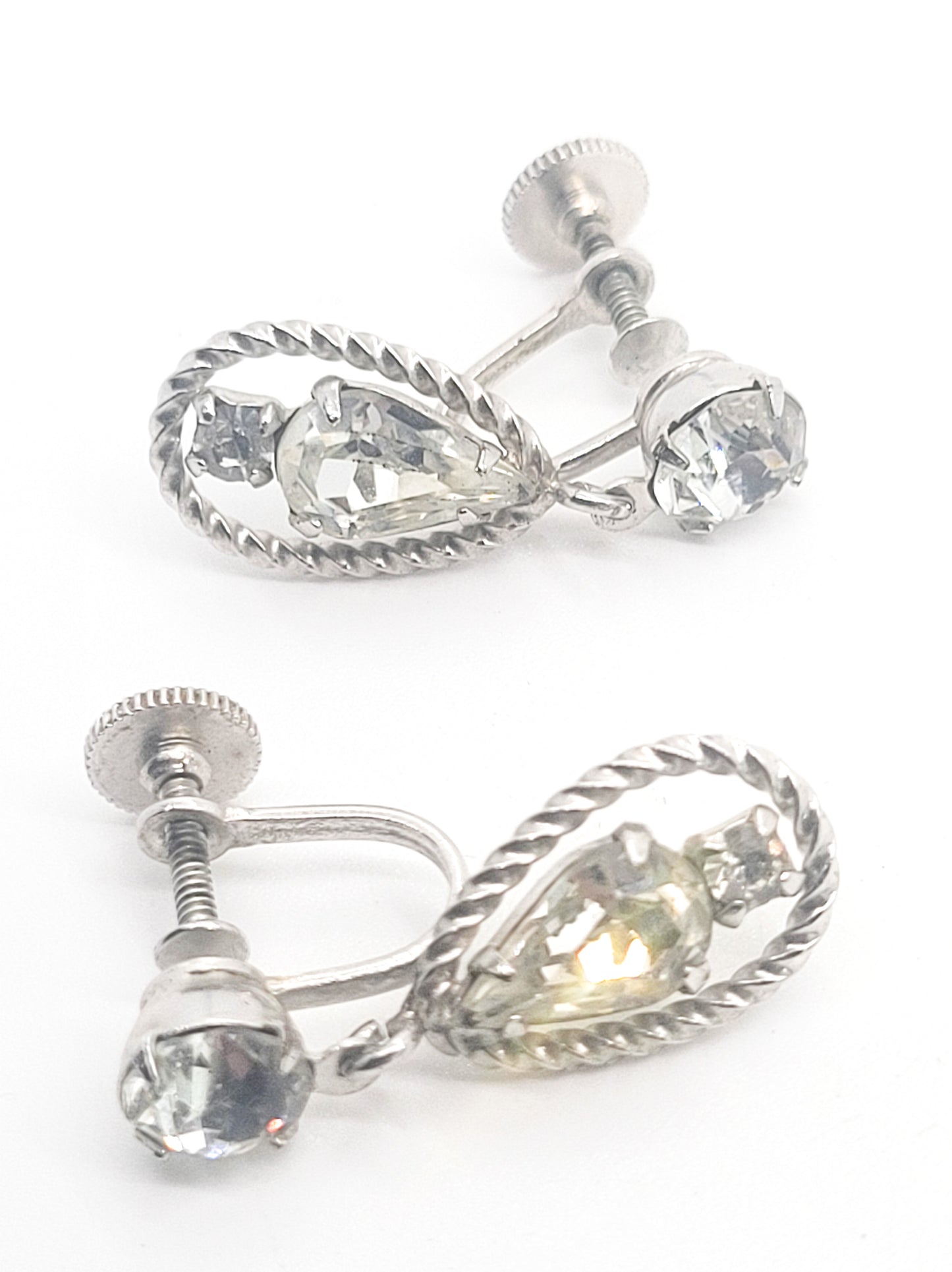 Twisted rope clear rhinestone silver toned screw back earrings