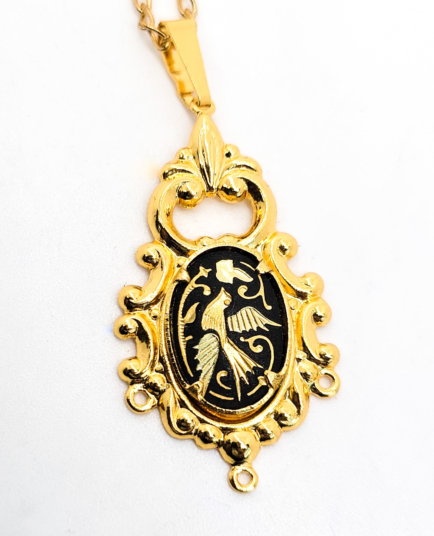 Spanish Damascene Flying swallow Black and Gold toned bird necklace